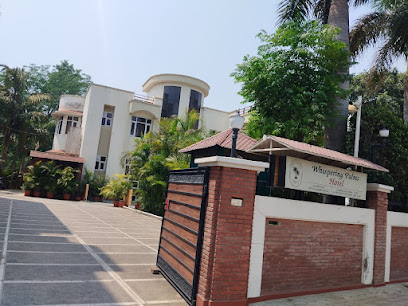 Whispering Palms Hotel