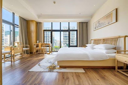 Puju Shuimo Yinshe Hotel