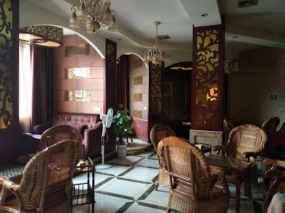 Yilong Huasheng Business Hotel