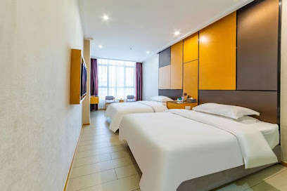 Longnan Qiji Hotel