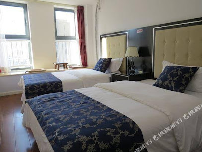 Guan County Hong Pu Traders Hotel