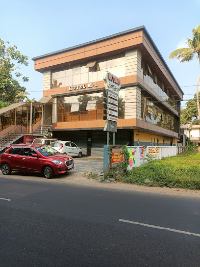 OYO 70103 M One Hotel Cherai