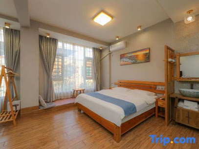 Xinping Xiaoguaijia Inn