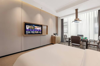 Wanzai Yijia La Maison Hotel