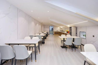 Qingmu Chain Hotel Xinghua Zhongyang Mansion