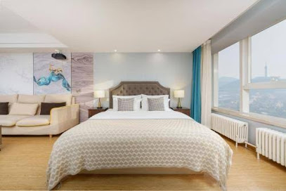 Dalian Qing Ni No.8 Light Apartment