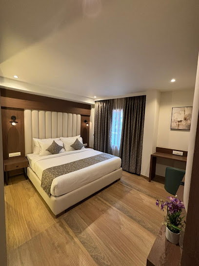 Grand Plaza Inn by RAK Rooms, Kannur