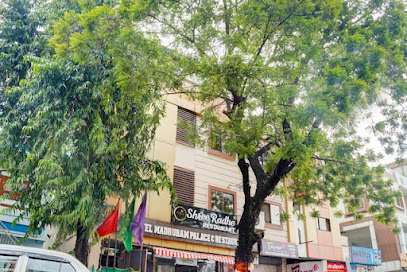 OYO New Madhuram Palace