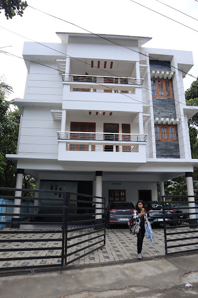 WHITE PORTICO THEKKADY