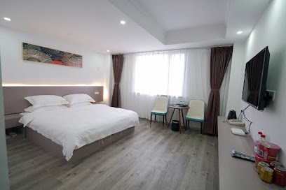 Guannan Qianxin Business Hotel