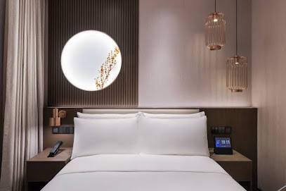 Orange Crystal Pinghu Hotel