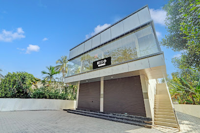 Hotel O Ambalamedu Puthenkurish Road