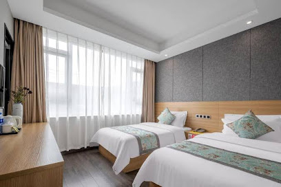 Xinjin Jinerxin Business Hotel