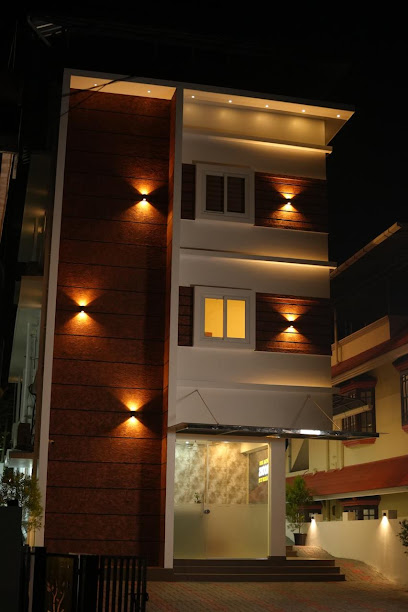 Hotel Alpha Inn Bystander Accommodation near Rajagiri Hospital