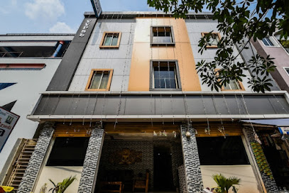 OYO Varsha Grand Residence