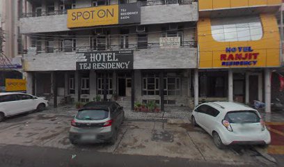 SPOT ON 64174 Tej Residency