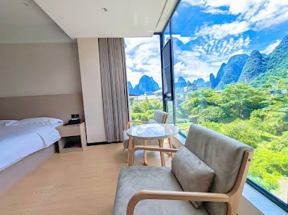 艾居酒店（兴坪古镇20元人民币景区店）