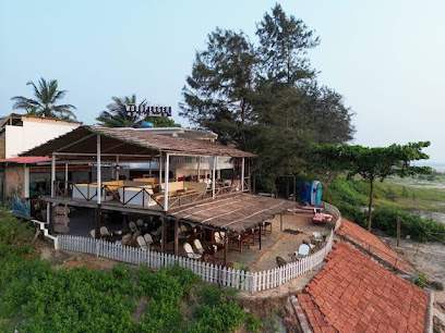 The Woodpecker By The Beach