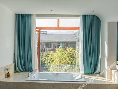 Emerald Whisper Hotel