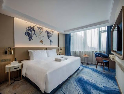 Kyriad Hotel Dongguan Shijie Daxin Jiangbin New City