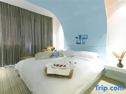 华美之家时尚旅店