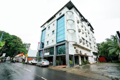 Capital O Hotel Malabar Inn